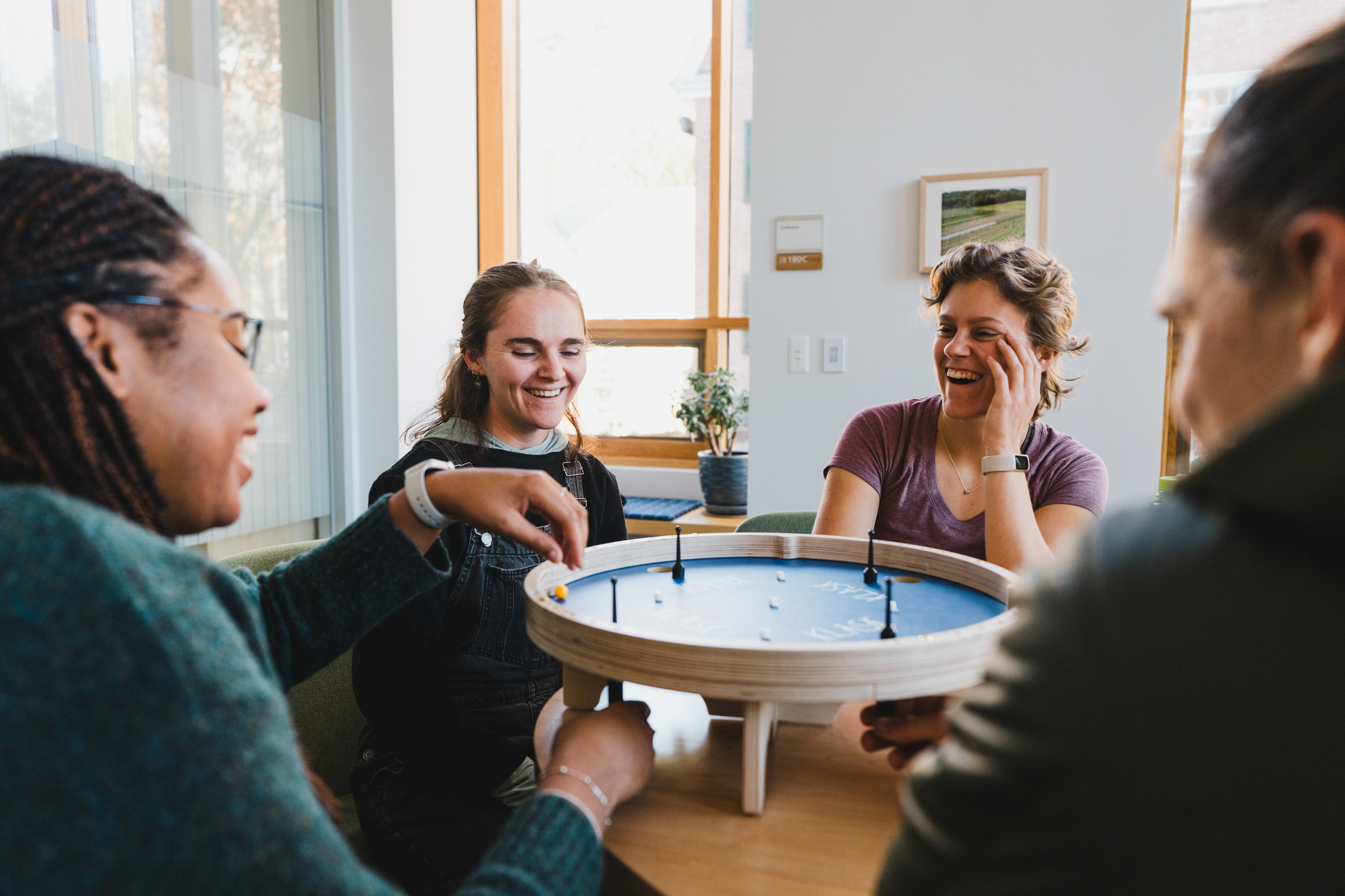 First generation students and staff play a game