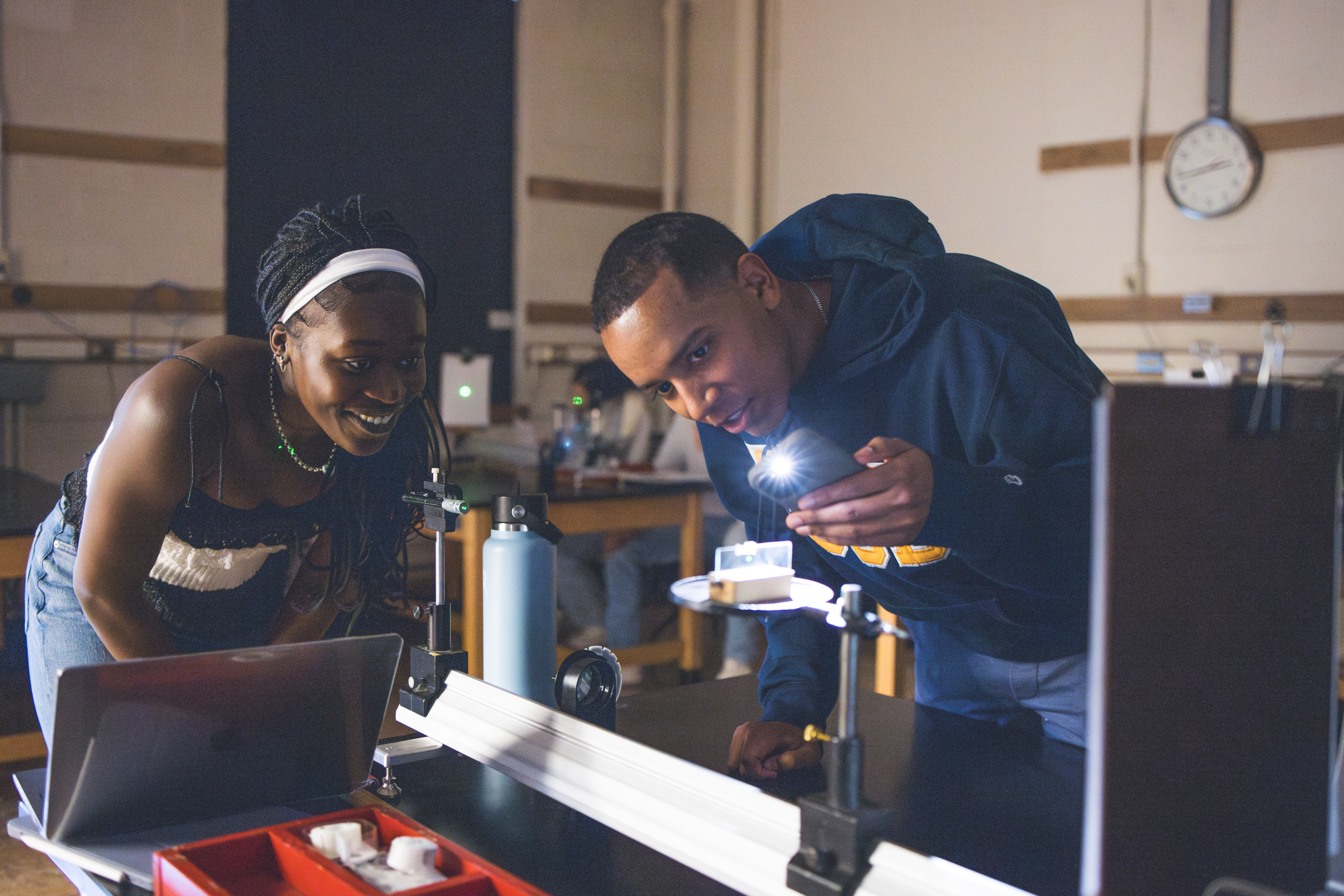 Students work in a physics lab